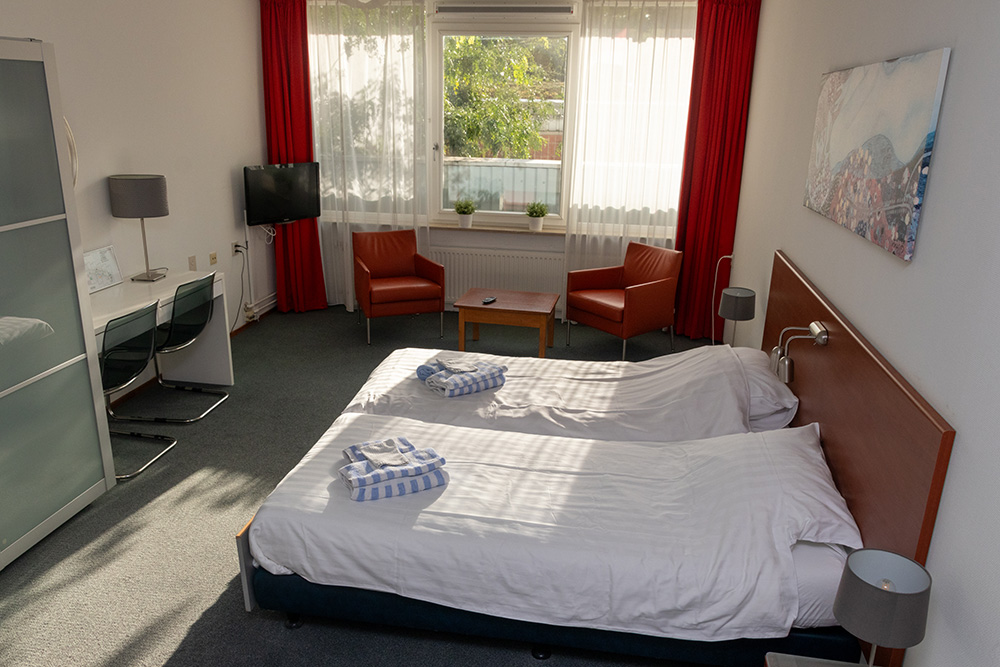 Logeerkamers Logeerkamer beschikbaar bij Serviceflat Schouwenhove